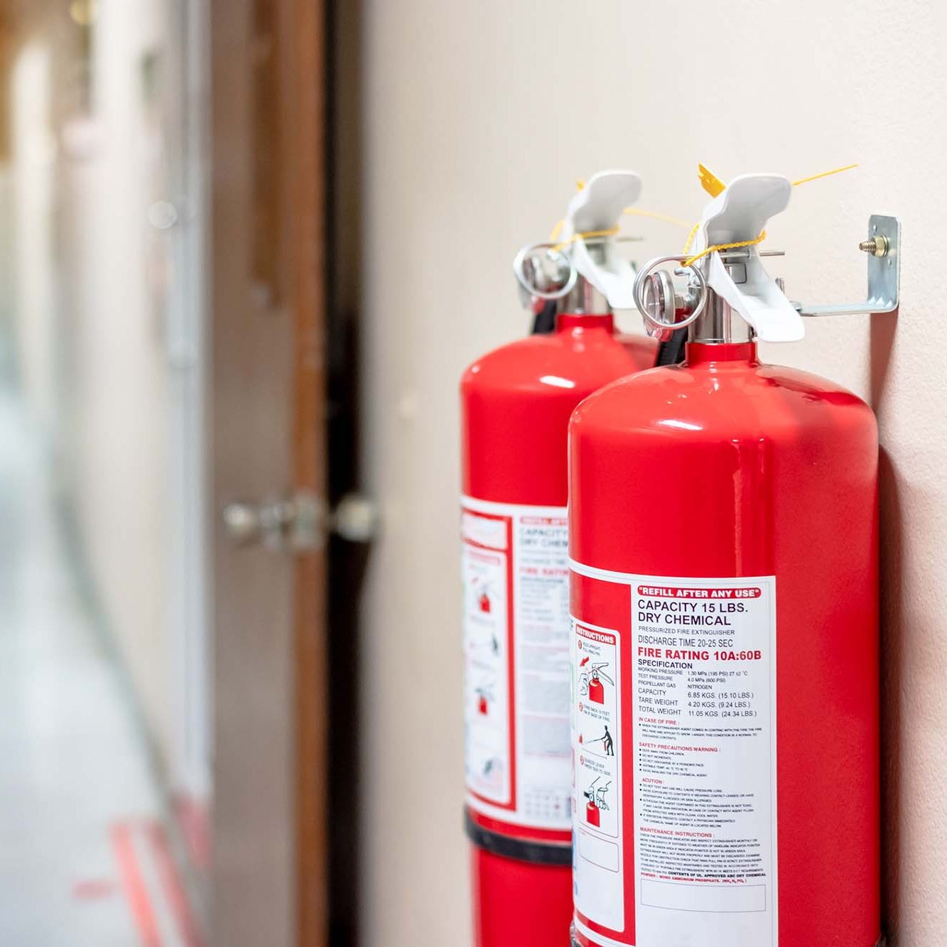 Fire extinguisher system on the wall background, powerful emergency equipment for industrial